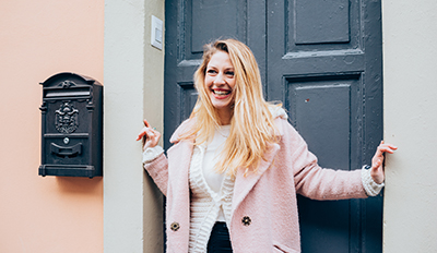 A girl in front of the door